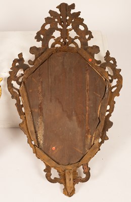 Lot 421 - A pair of Iate 18th Century Italian gilt framed cartouche-shaped mirrors