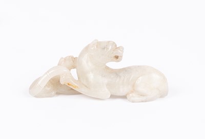 Lot 25 - A Chinese jade carving of a leopard and cub