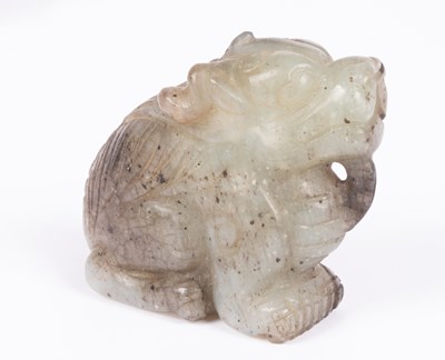 Lot 27 - A Chinese jade carving of a grotesque beast