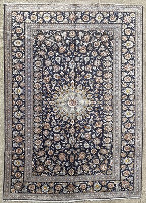 Lot 458 - A Kashan carpet