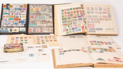 Lot 201 - Four stamp albums and some loose stamps