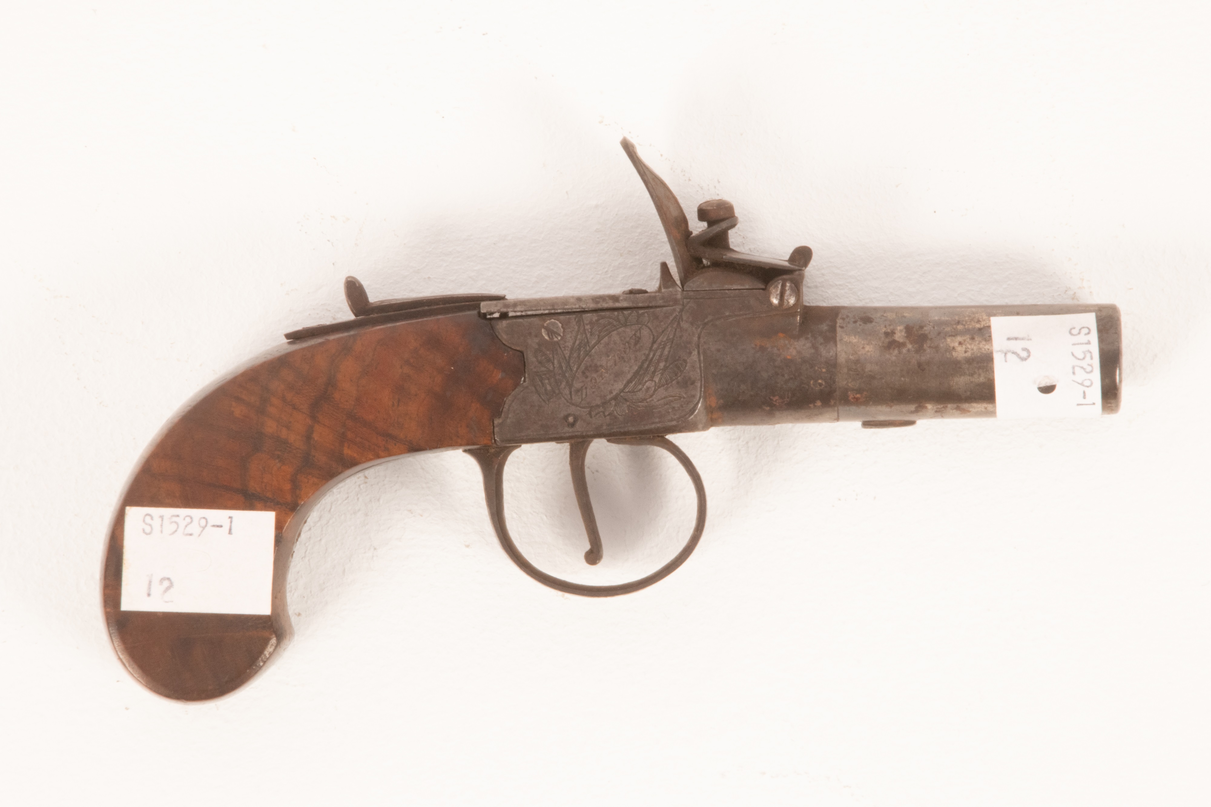 Lot 225 - A Queen Anne flintlock pistol