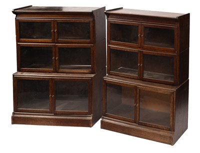 Lot 368 - A pair of oak sectional bookcases