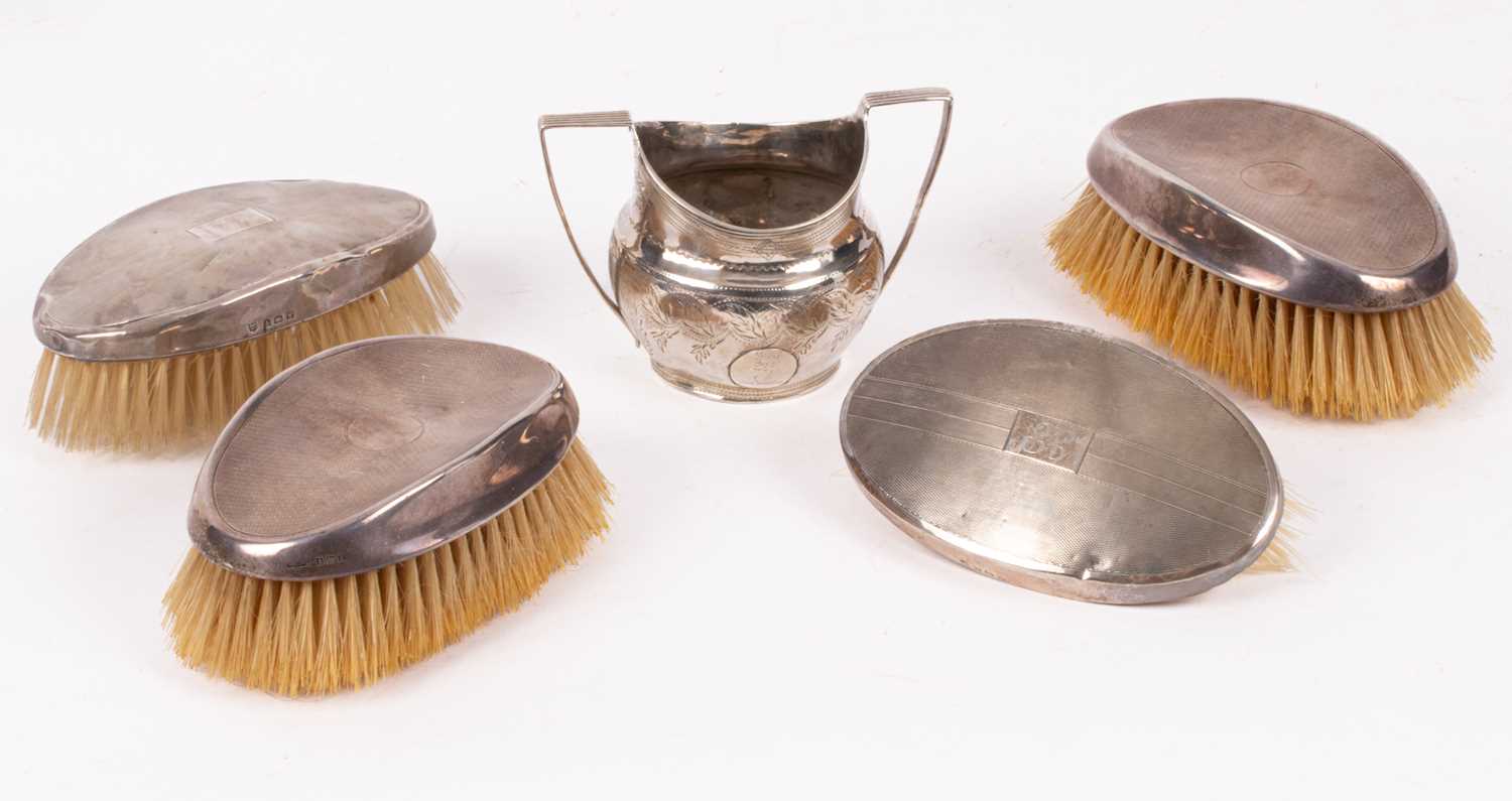 Lot 18 - Two pairs of silver mounted brushes