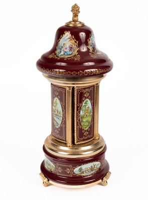 Lot 205 - A enamelled and gilt metal musical carousel and cigarette dispenser