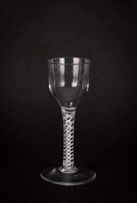 Lot 201 - An English 18th Century opaque twist wine glass