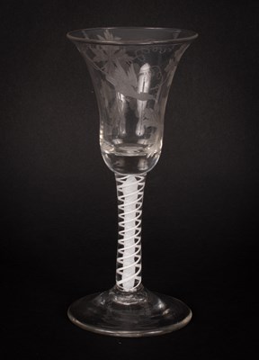 Lot 203 - An English 18th Century engraved opaque twist wine glass