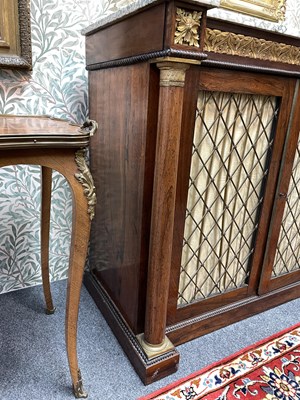 Lot 427 - A marble top cabinet