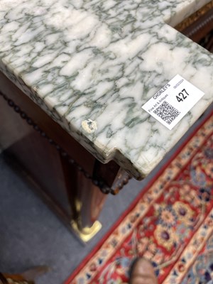 Lot 427 - A marble top cabinet