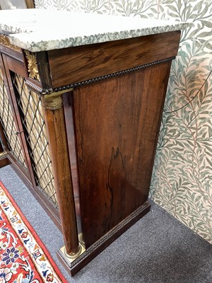 Lot 427 - A marble top cabinet