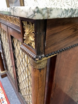 Lot 427 - A marble top cabinet