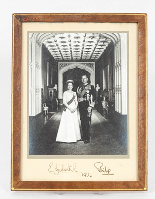 Lot 848 - A signed black and white photograph of HM Queen Elizabeth II and HRH Prince Philip dated 1976