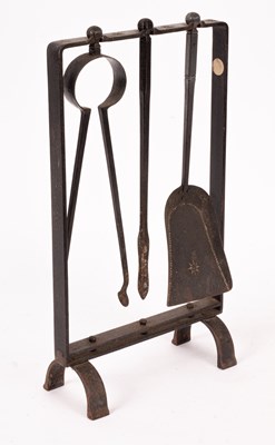 Lot 271 - A set of blackend steel fire irons and stand