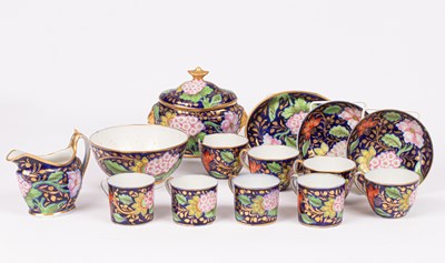 Lot 779 - An English porcelain part tea service