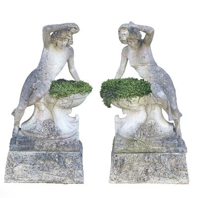 Lot 334 - A pair of reconstituted stone planters