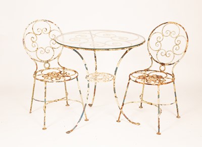 Lot 337 - A pair of white painted metal garden chairs and a matching table