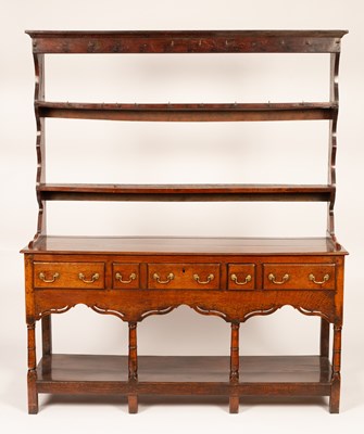 Lot 384 - An 18th Century oak dresser