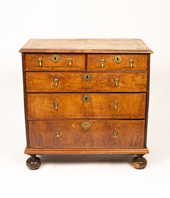 Lot 436 - An early 18th Century walnut and featherbanded chest of drawers