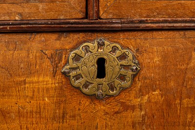 Lot 436 - An early 18th Century walnut and featherbanded chest of drawers