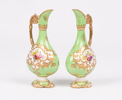 Lot 239 - A pair of Royal Crown Derby small ewers