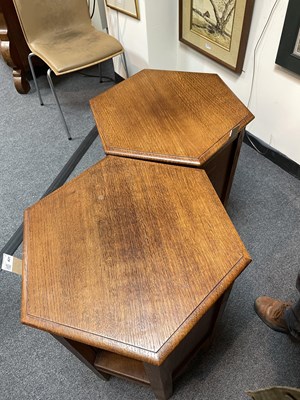 Lot 431 - A pair of Arts & Crafts oak hexagonal bedside tables