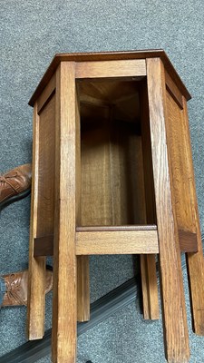 Lot 431 - A pair of Arts & Crafts oak hexagonal bedside tables