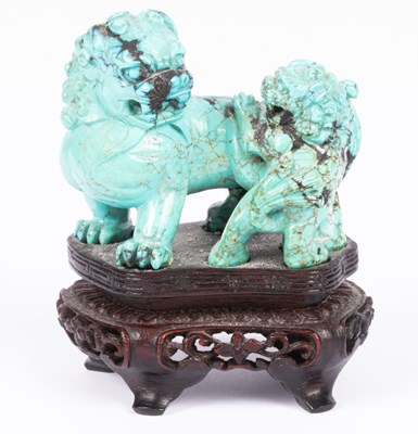 Lot 2 - A Chinese carved turquoise matrix dog of Fo