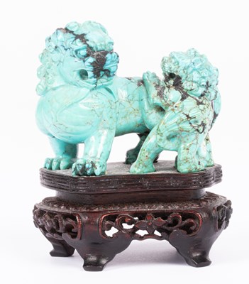 Lot 2 - A Chinese carved turquoise matrix dog of Fo