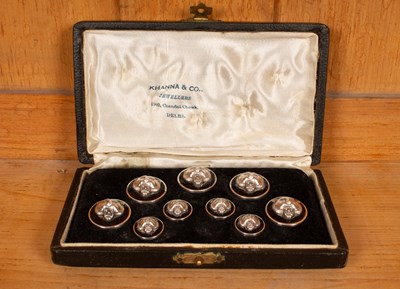 Lot 562 - A boxed set of Indian silver buttons