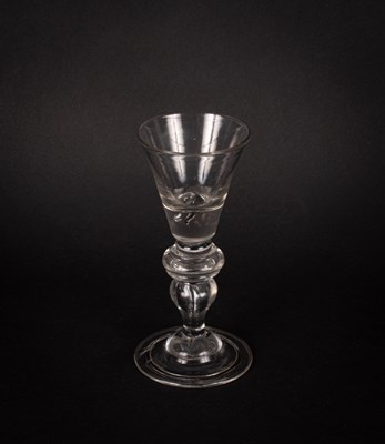 Lot 191 - An English heavy baluster wine glass