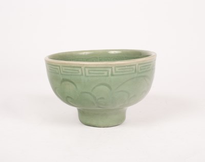 Lot 55 - A Ming celadon incised bowl