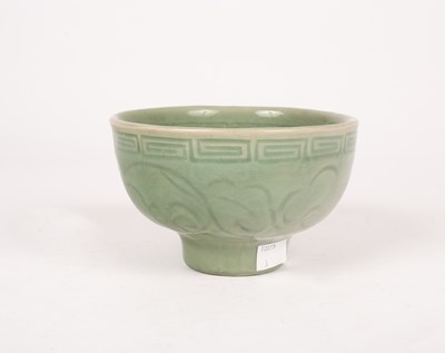 Lot 55 - A Ming celadon incised bowl