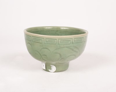 Lot 55 - A Ming celadon incised bowl