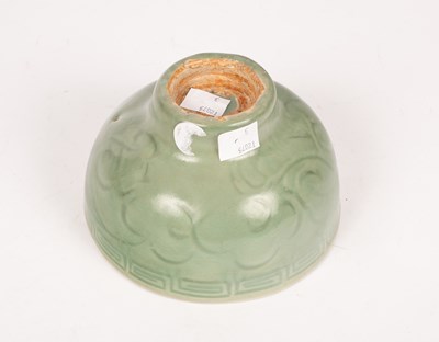 Lot 55 - A Ming celadon incised bowl