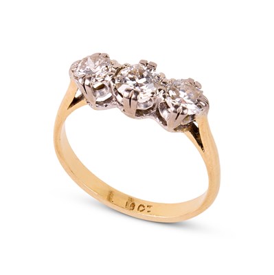 Lot 233 - An 18ct yellow gold and diamond three-stone ring