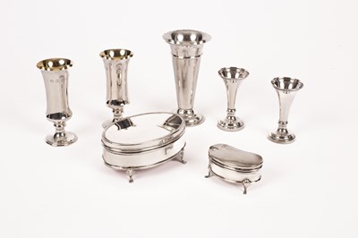 Lot 51 - A pair of silver and silver gilt vases