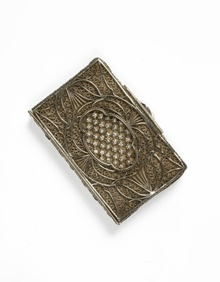 Lot 394 - A silver filigree needle book