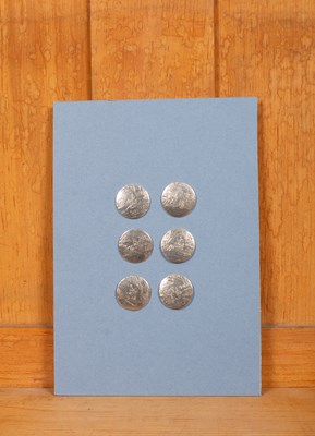 Lot 559 - A set of six silver buttons