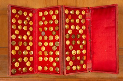 Lot 521 - A tailor’s folding case of hunt buttons