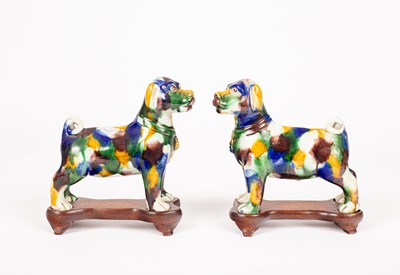 Lot 3 - A pair of Chinese Sancai-glazed pug dogs