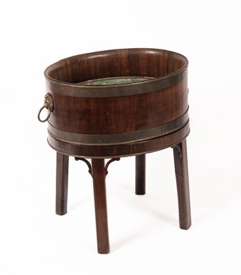 Lot 614 - A George III style mahogany wine cooler
