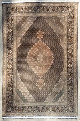 Lot 714 - A Tabriz carpet