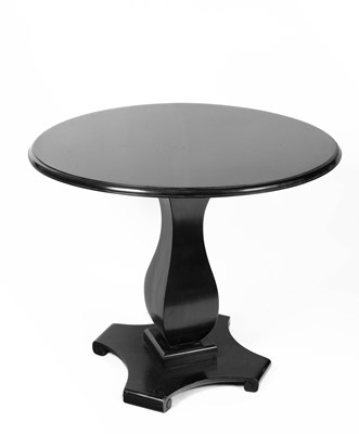Lot 619 - A 20th Century ebonised table