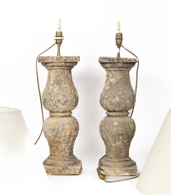 Lot 851 - A pair of reconstituted stone table lamps