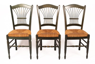 Lot 626 - A set of three green stained kitchen chairs