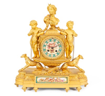 Lot 228 - A French ormolu and Sèvres style porcelain mantel clock