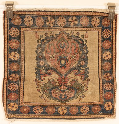 Lot 345 - A Feraghan or Sarouk armorial rug