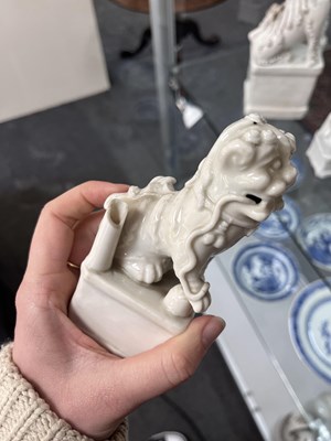 Lot 23 - A Chinese blanc de chine figure of a dog of Fo