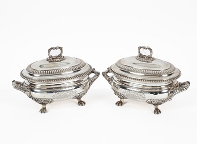 Lot 15 - A pair of George III two-handled silver sauce tureens and covers