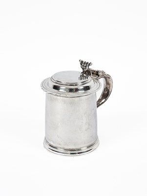 Lot 6 - A Queen Anne plain cylindrical silver tankard